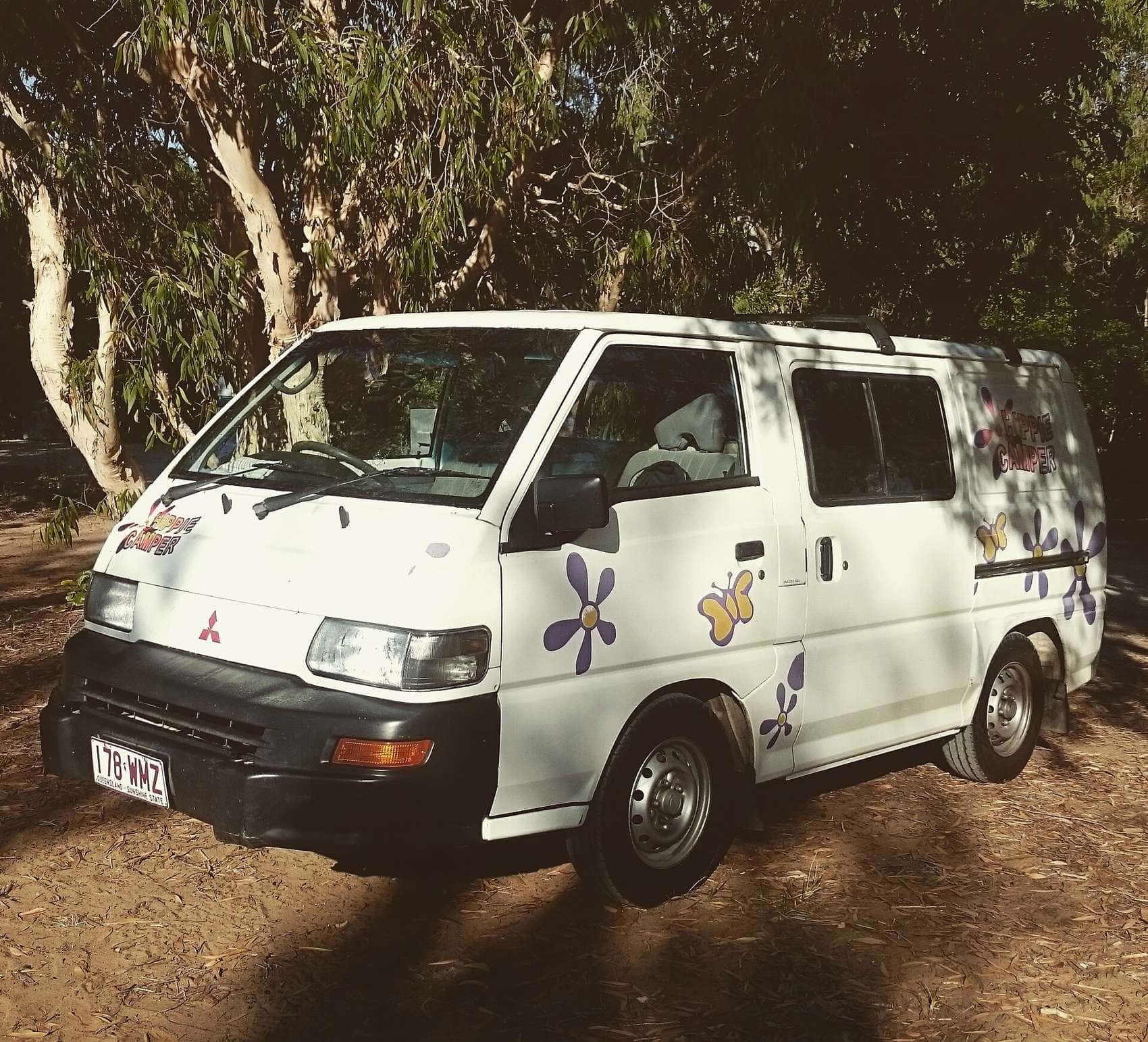 A campervan parked by the road in the Australian countryside